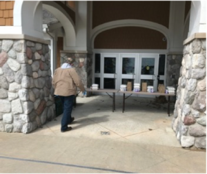 Charlevoix Charlevoix County Transit driver picks up meal at school and delivers them to students.